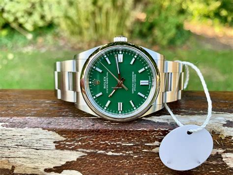 rolex oyster perpetual date green price|rolex oyster perpetual price list.